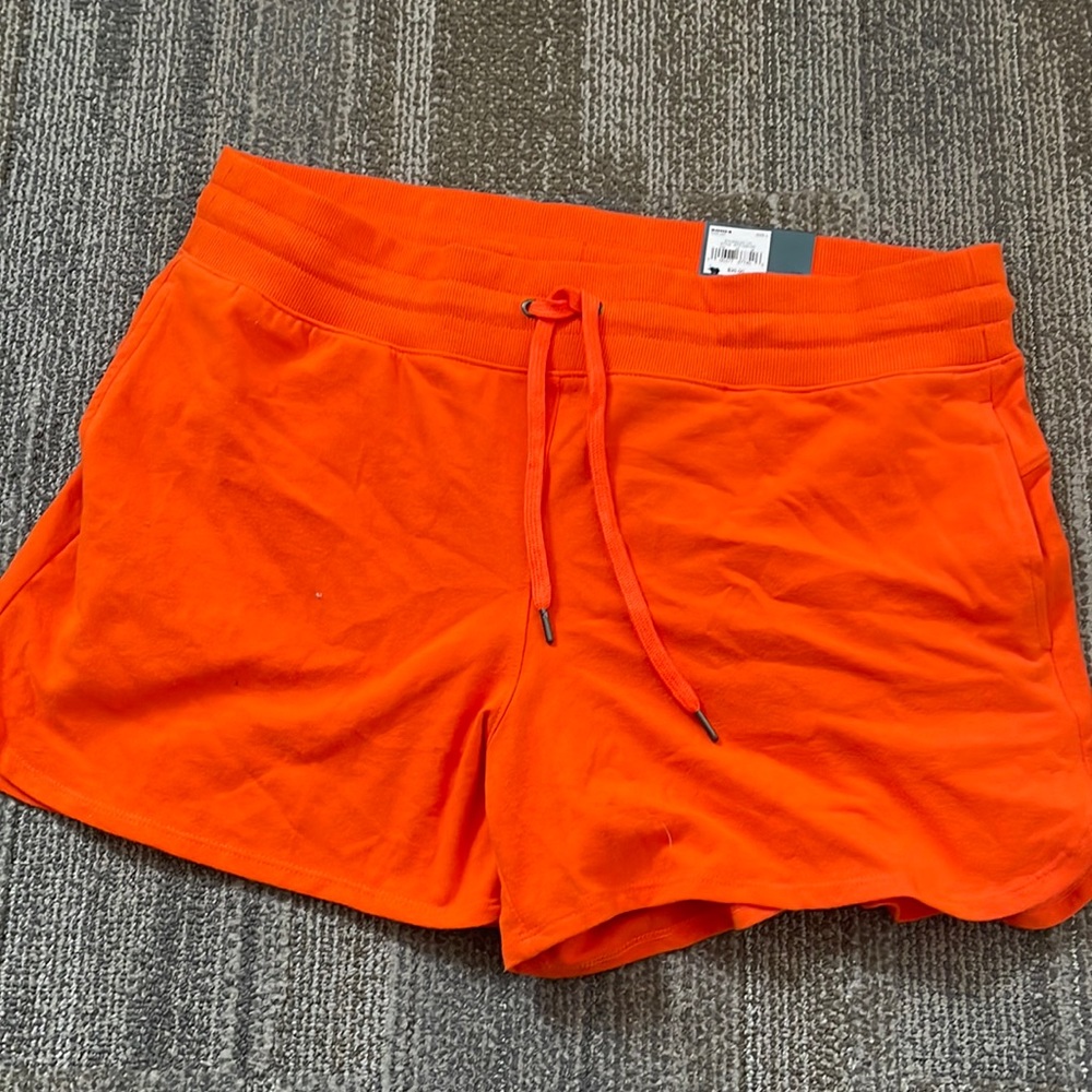 Orange, Tek Gear shorts. new